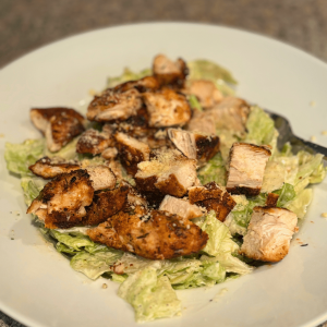Bowl of Cajun Chicken Caesar Salad.