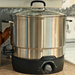 Electric canner sitting on the counter.