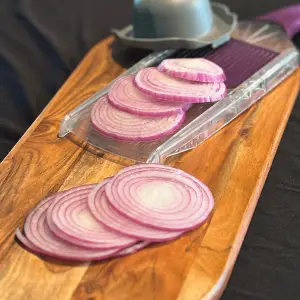 Red onions sliced with a mandoline.