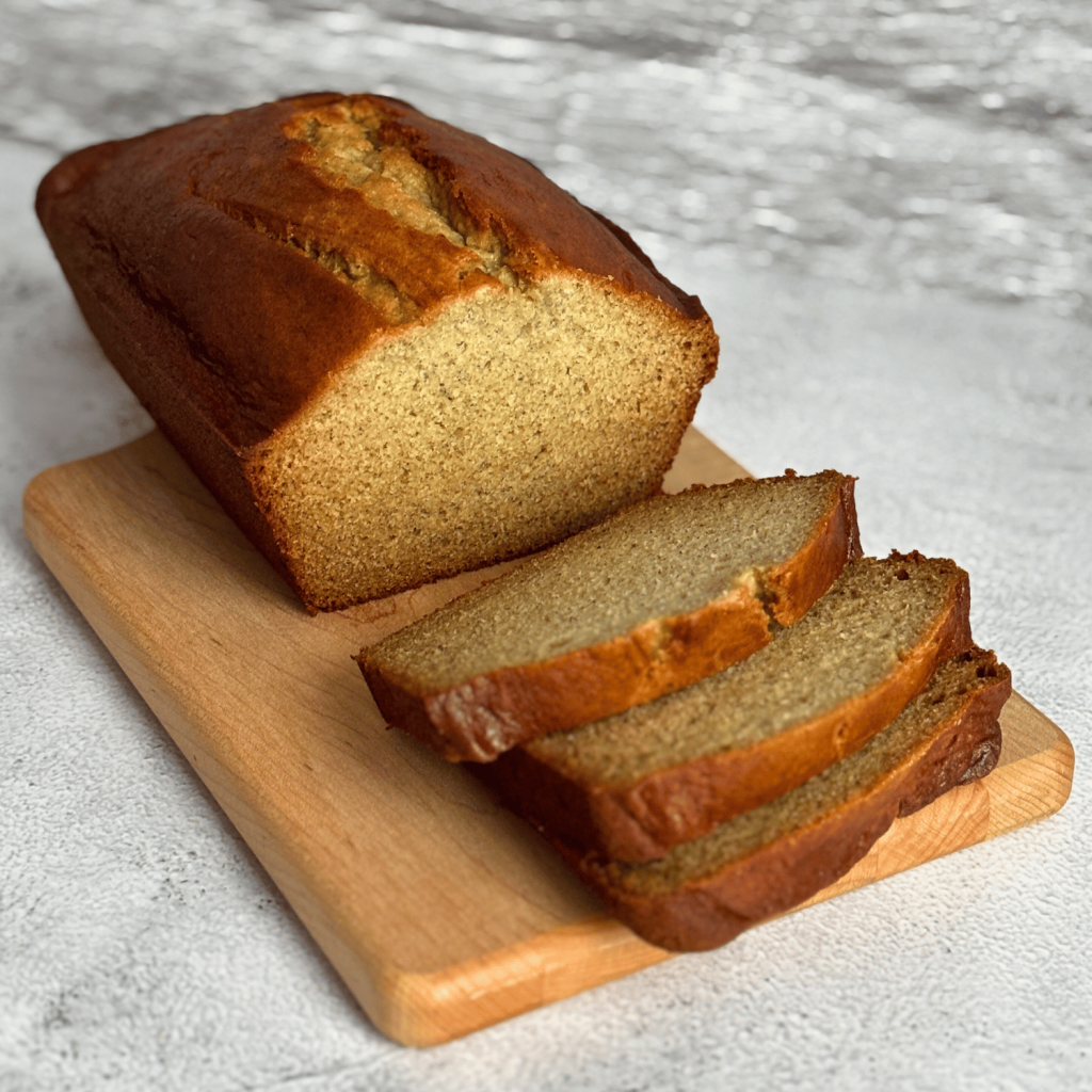 Sliced banana bread on a cutting board