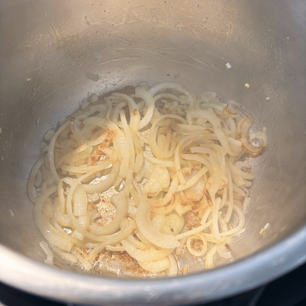 Onions browning in an instant pot.