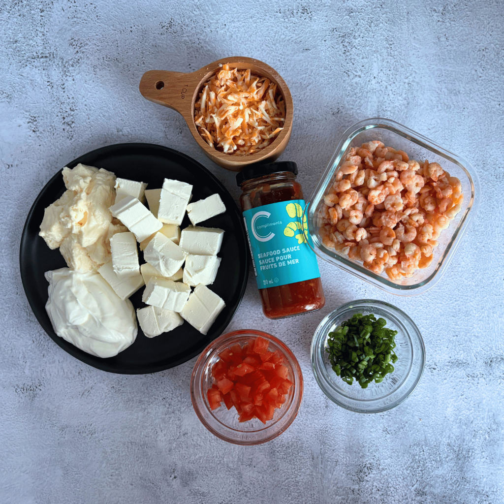 Ingredients for the layered crab dip laid out on the counter.