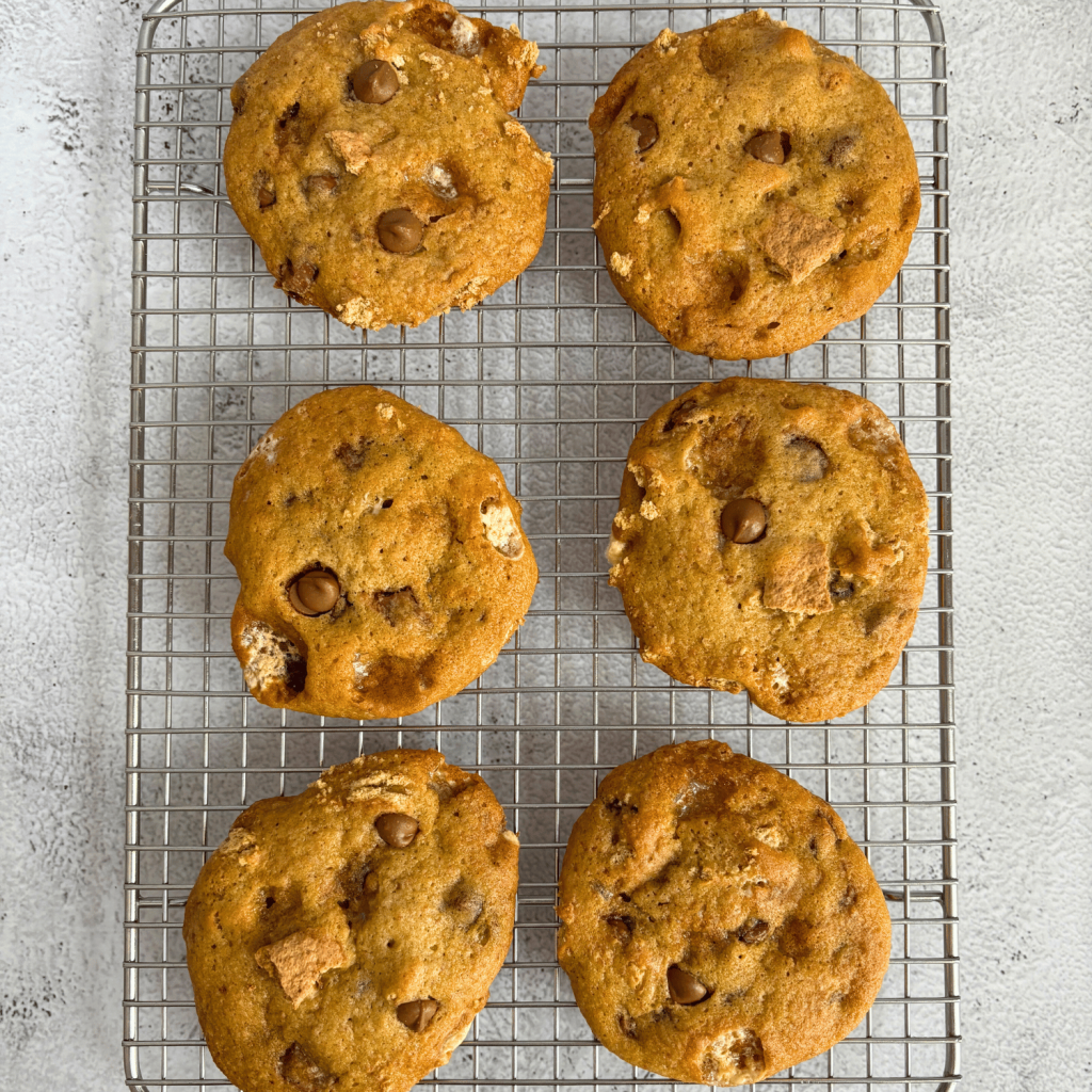 Six sourdough discard smores cookies on a cooling rack