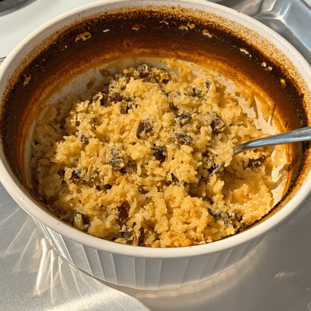 Baking dish of baked rice pudding.