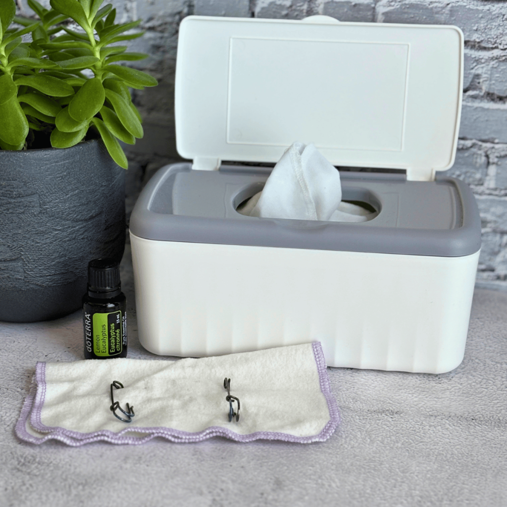Dryer sheet and dispense next to flannel cloths with safety pins.