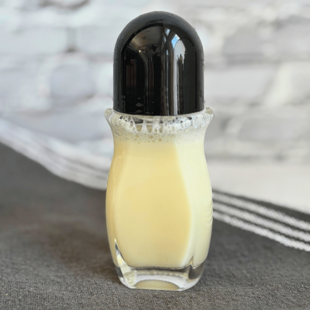 Roll on bottle of laundry stain remover