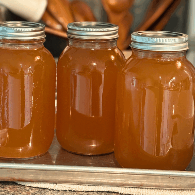 Homemade Chicken Bone Broth in quart jars