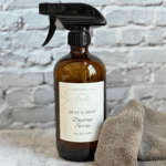 Spray bottle of dusting spray.