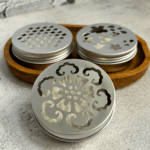 DIY Deodorizing Disks on a wooden platter.