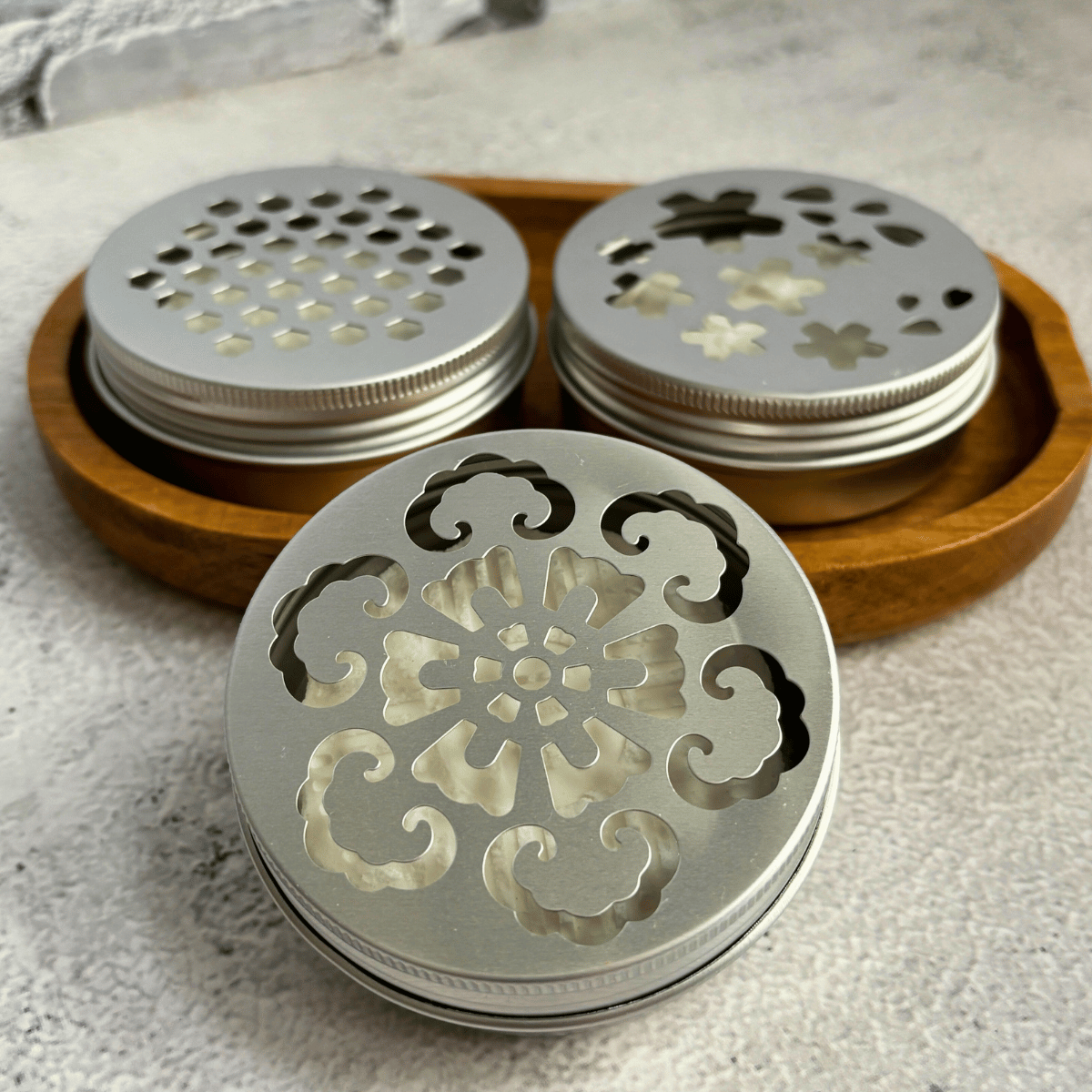 DIY Deodorizing Disks on a wooden platter.