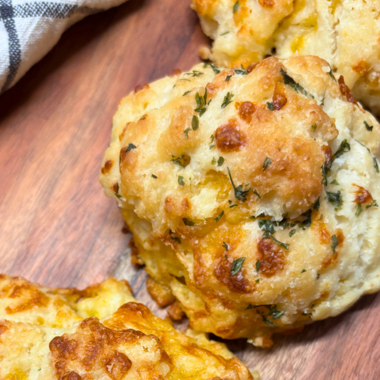 Garlic Buttered Cheese Biscuits on a wooden board