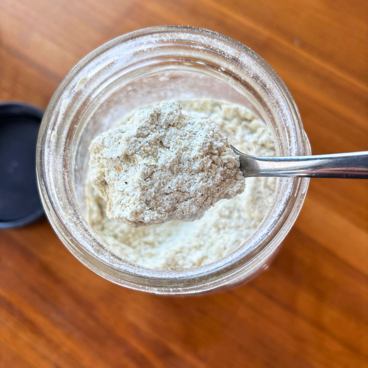 Spoonful of Cream of Everything Soup mix over a mason jar